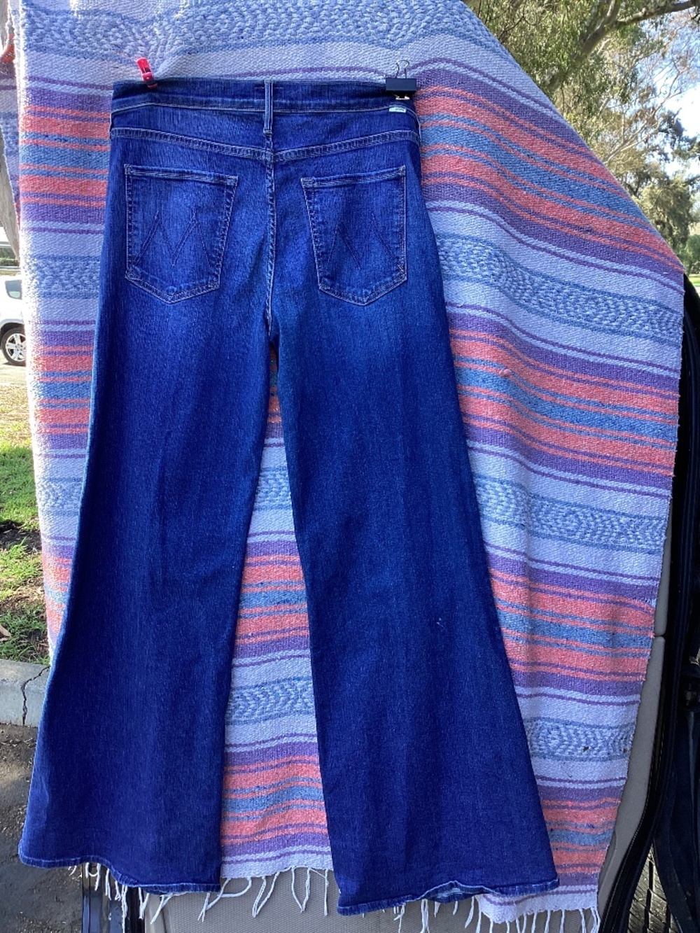 Mother denim. The Twister Sneak on the left size 31